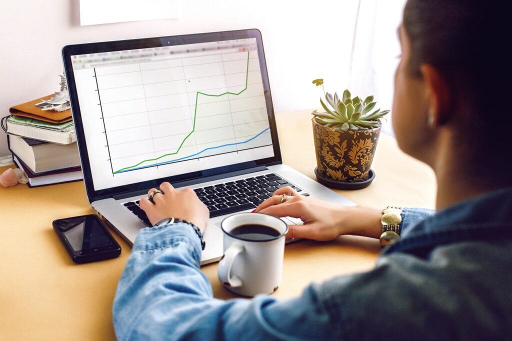 stylish young hipster girl working economist financial analytics